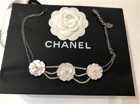 chanel camellia logo|Chanel camellia flower necklace.